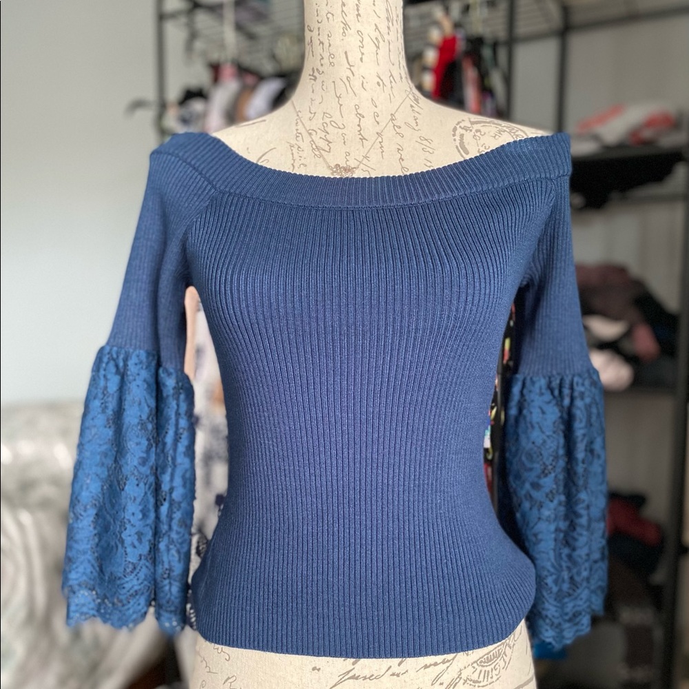 Beautiful blue off shoulder sweater top.